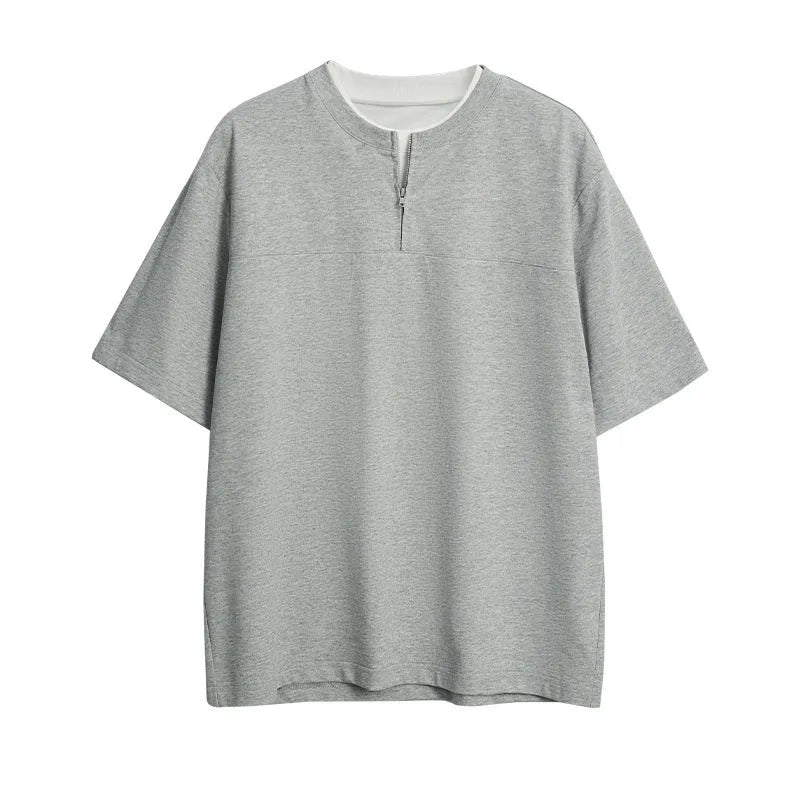 Women's loose fit solid colour patchwork pullover top with zip false detail in cotton blend fabric.