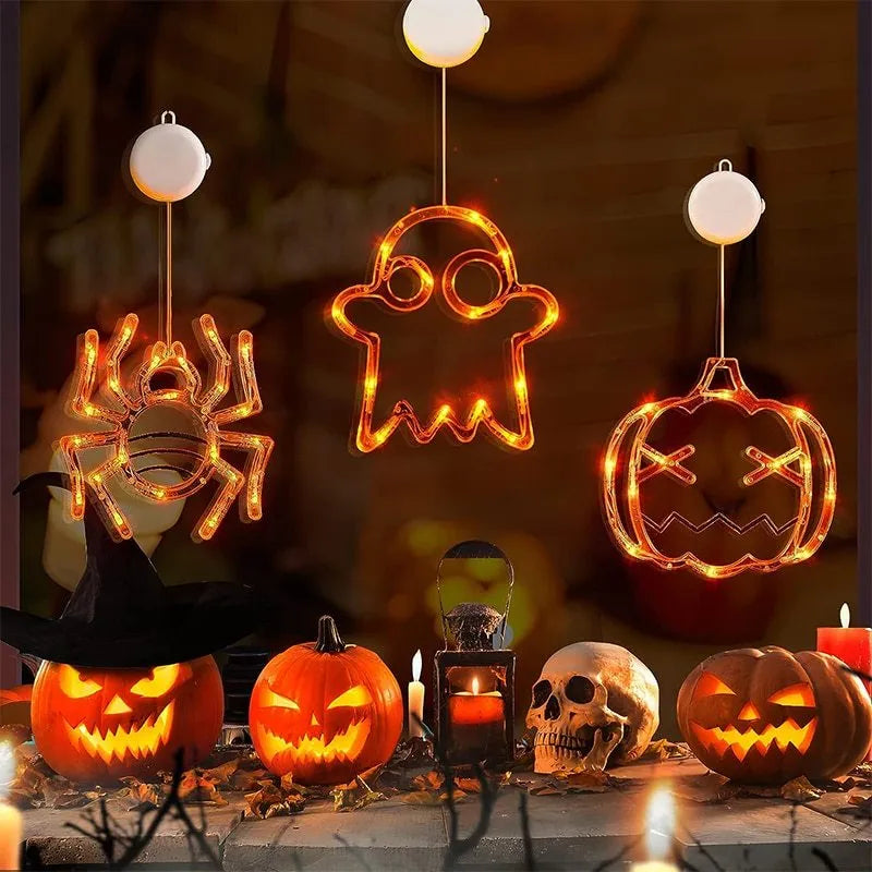 Halloween window hanging LED lights set with seven battery-powered horror-themed decorative pieces