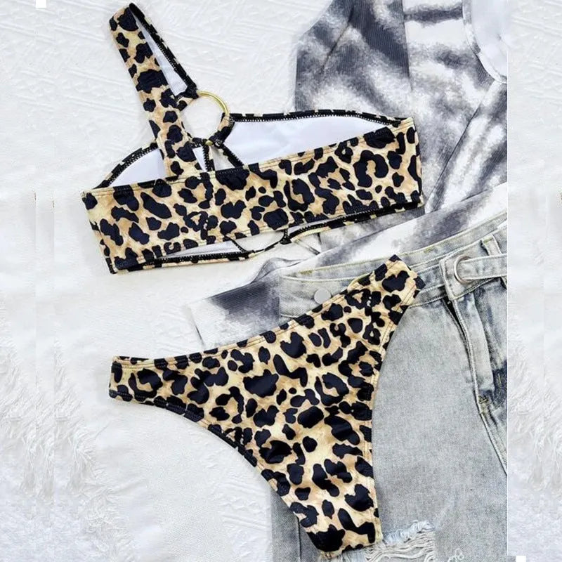 Women's leopard print bikini set with hollow polka dot pattern and nylon construction