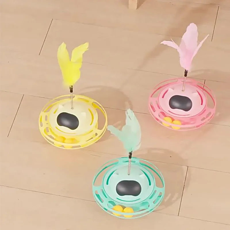 Pink cat tumbler turntable toy with stick attachment measuring 17cm by 10cm