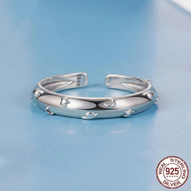 S925 sterling silver planet open ring with polished finish on a woman's finger, BSR692-E colour, adjustable size