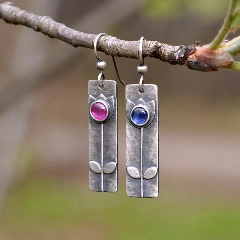 Antique finish red sapphire geometric earrings with retro style and elliptical design elements