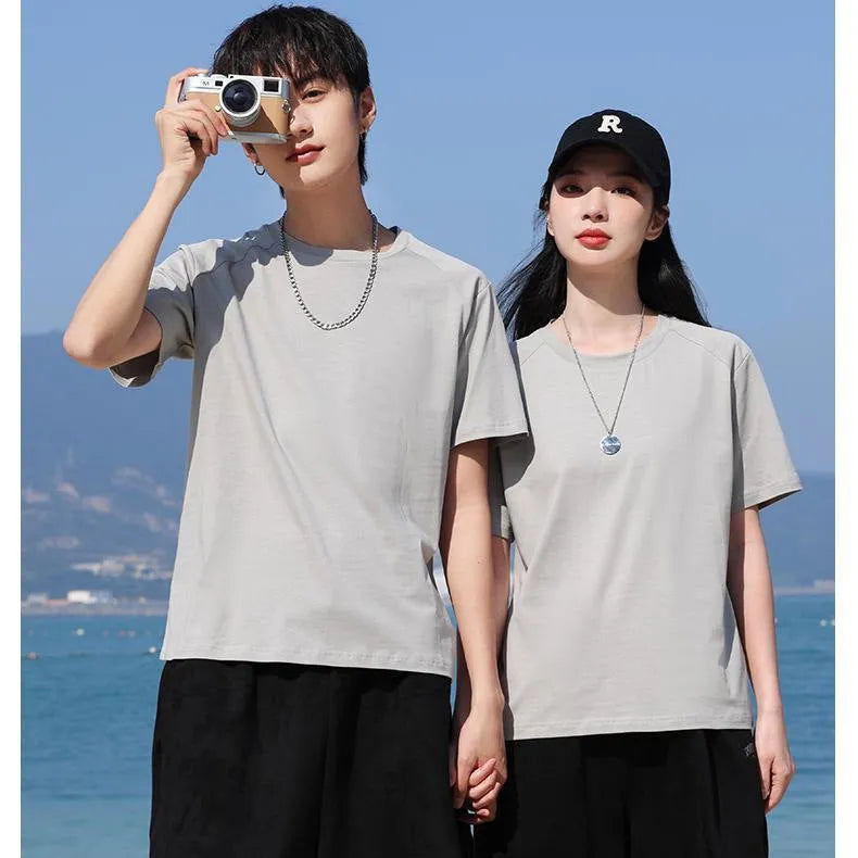 Men's plain pure cotton short sleeve t-shirt on a hanger, shown in multiple solid colours.
