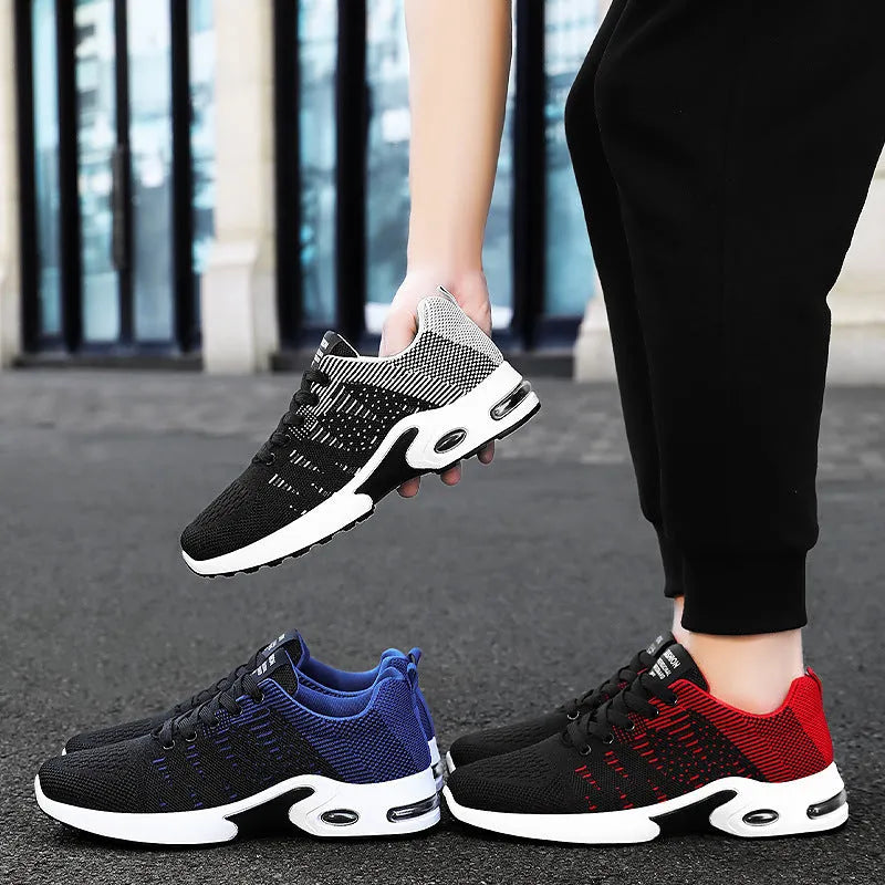 Men's black and grey Flyknit mesh sneakers with soft sole and lace-up design
