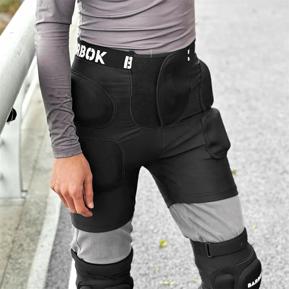 Black roller skating hip protection pants with NBR foam padding for fall safety