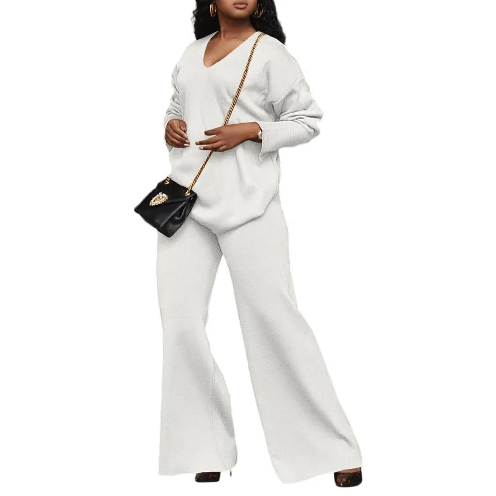 Women's brown thick suede velvet two-piece suit with split long sleeves and matching trousers.