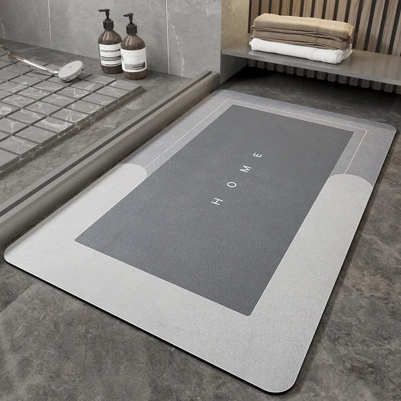 Blended fabric bathroom floor mat in blue, available in oval and rectangle shapes.
