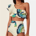 White women's one-shoulder swimsuit with a flounced lotus leaf skirt and high side split.