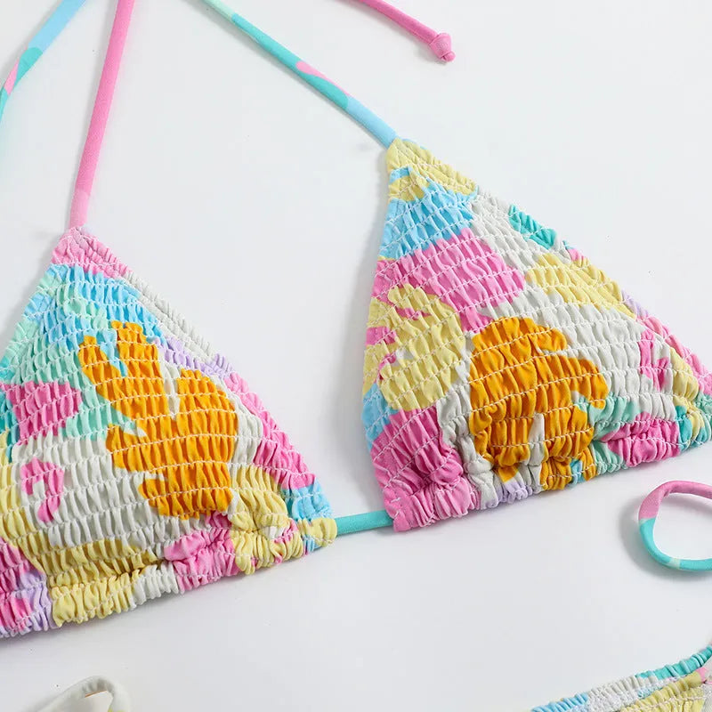 Multicolour floral gradient triangle bag bikini swimsuit with smocking detail for women.