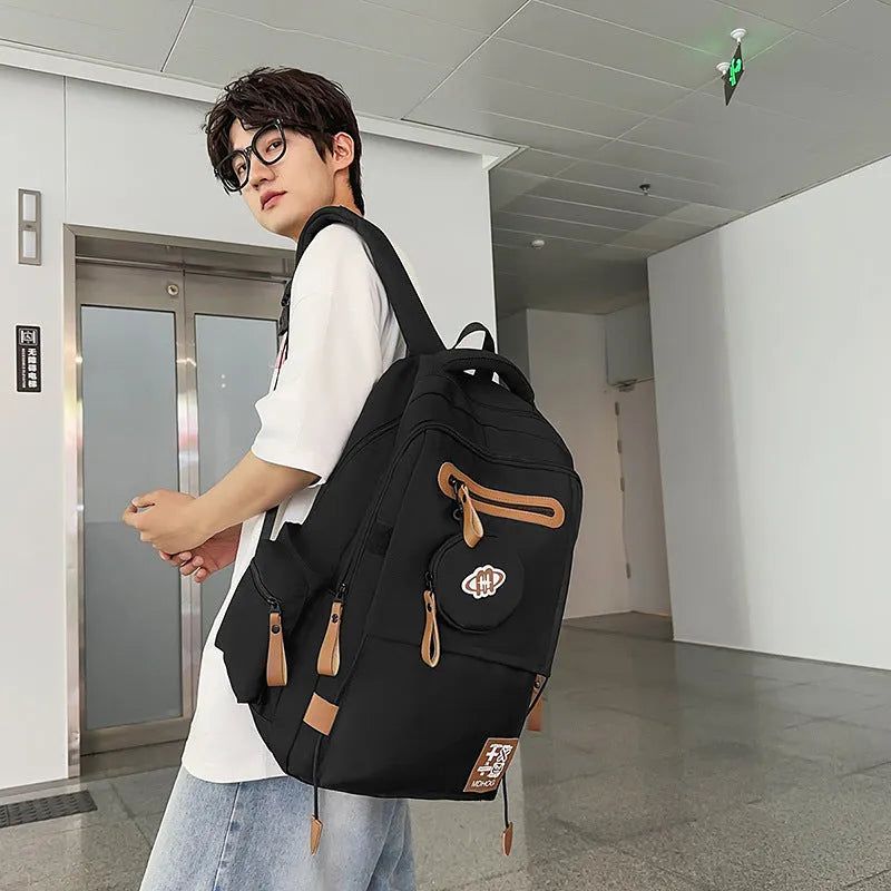 Large waterproof nylon travel backpack with contrast stitching in various colour options