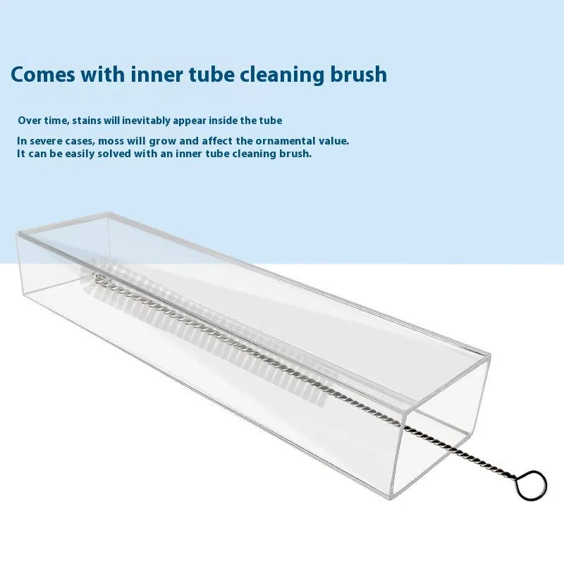 Aquarium feeding tube kit with cleaning brush and feed spoon on blue background