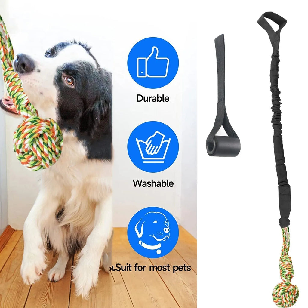 Braided cotton dog tug-of-war rope toy in red, shown with a dog gripping one end.