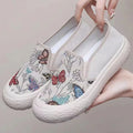 Old Beijing women's canvas slip-on shoes with soft plastic soles in black and white colour options