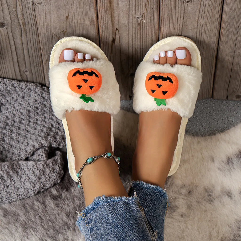 Open toe pumpkin plush slippers in synthetic fur with cartoon design and PVC soles