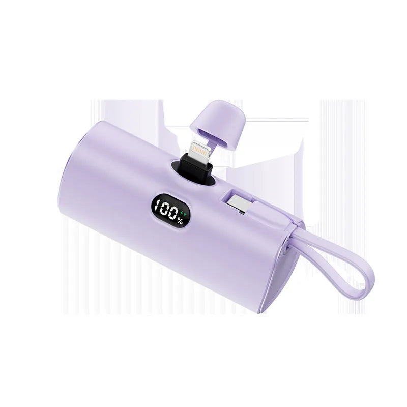 Capsule-shaped wireless power bank with digital display and built-in plug in five colour options.