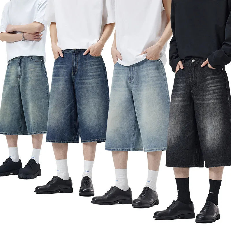 Man wearing light blue straight-leg cropped denim shorts for casual summer wear.