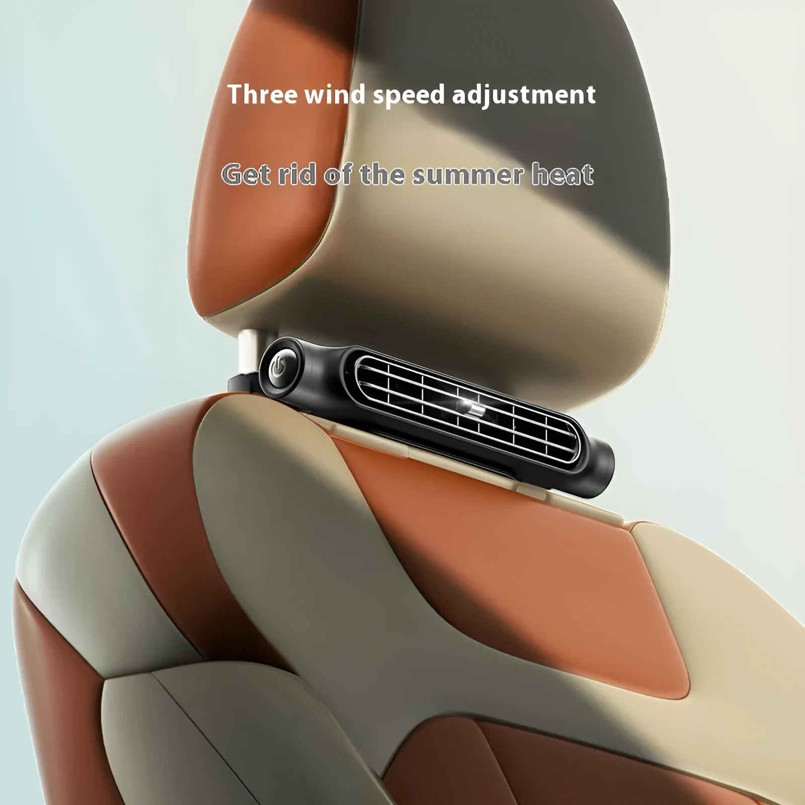 Beige bladeless USB car fan with Velcro mount attached to a car headrest