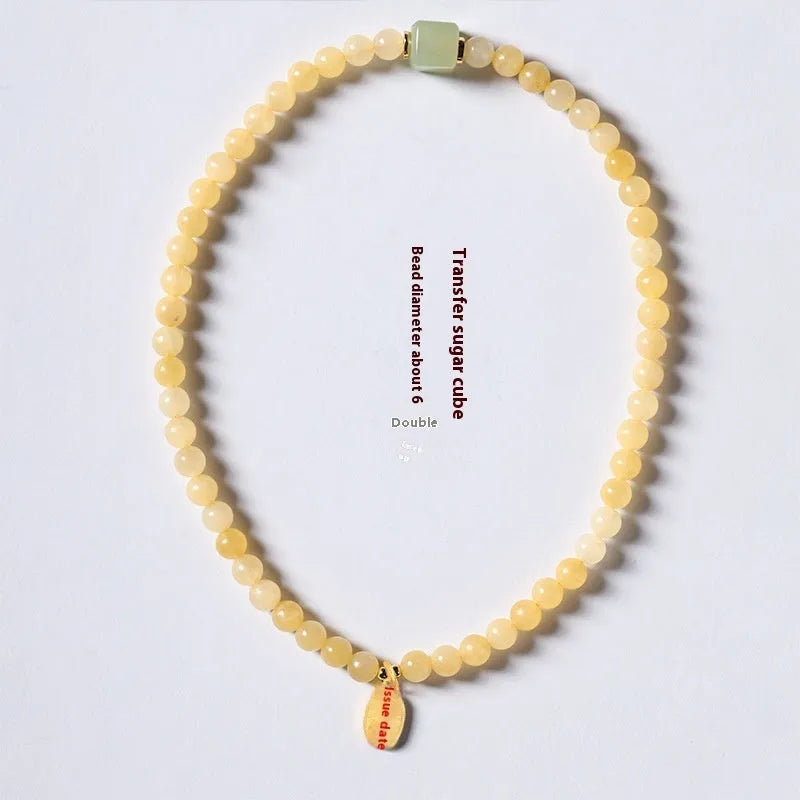 Women's hand-woven topaz bracelet with barrel beads and square sugar jade beads featuring fu character