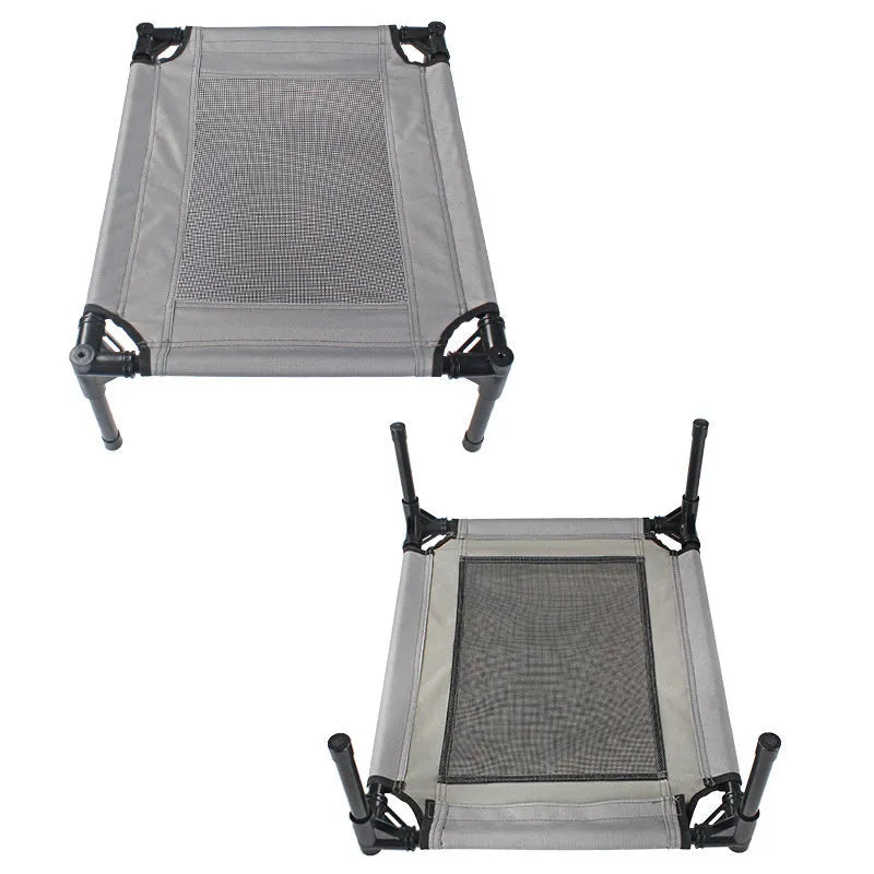 Black portable outdoor dog bed with removable washable cover and steel frame, shown on grass.
