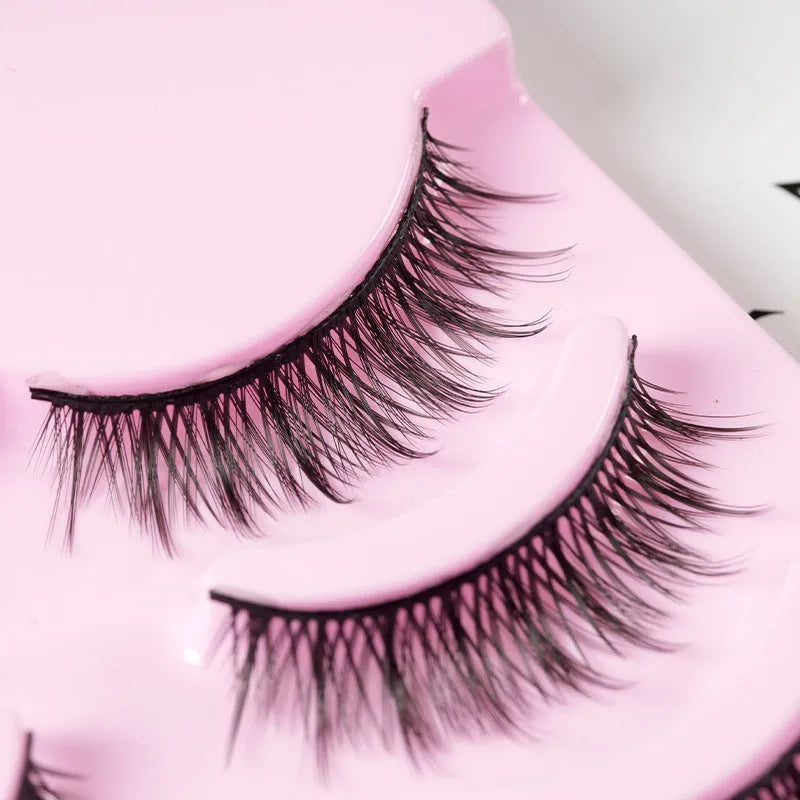 Pack of black manga style false eyelashes with natural wispy length for Korean makeup and cosplay.