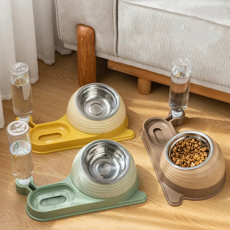 Brown automatic cat water dispenser and elevated food bowl set on a floor.