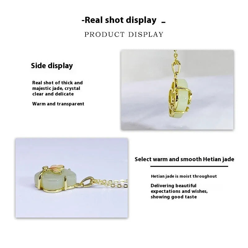 Magnolia flower Hetian jade and sterling silver necklace, bracelet, and earrings set on a white background.