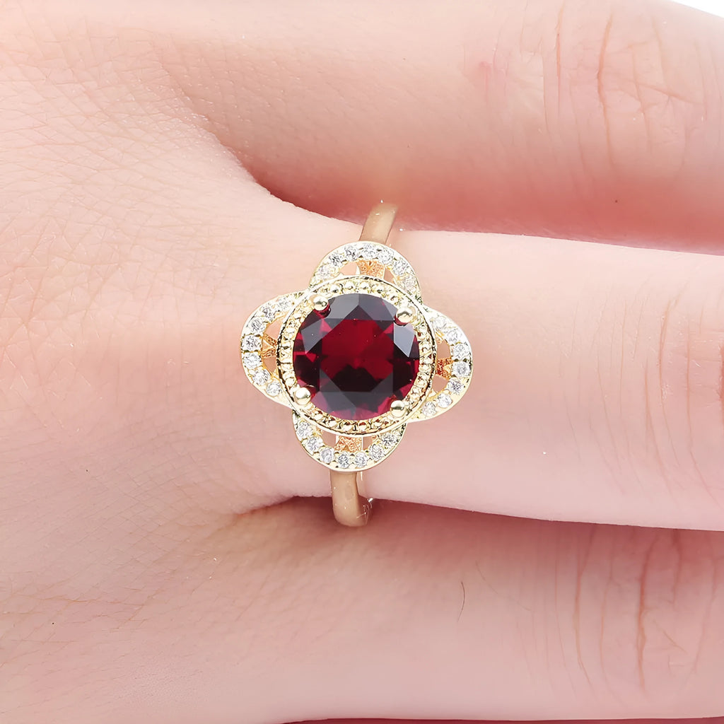 Copper ring with a silver-toned zircon fruit-shaped inlay on a band.