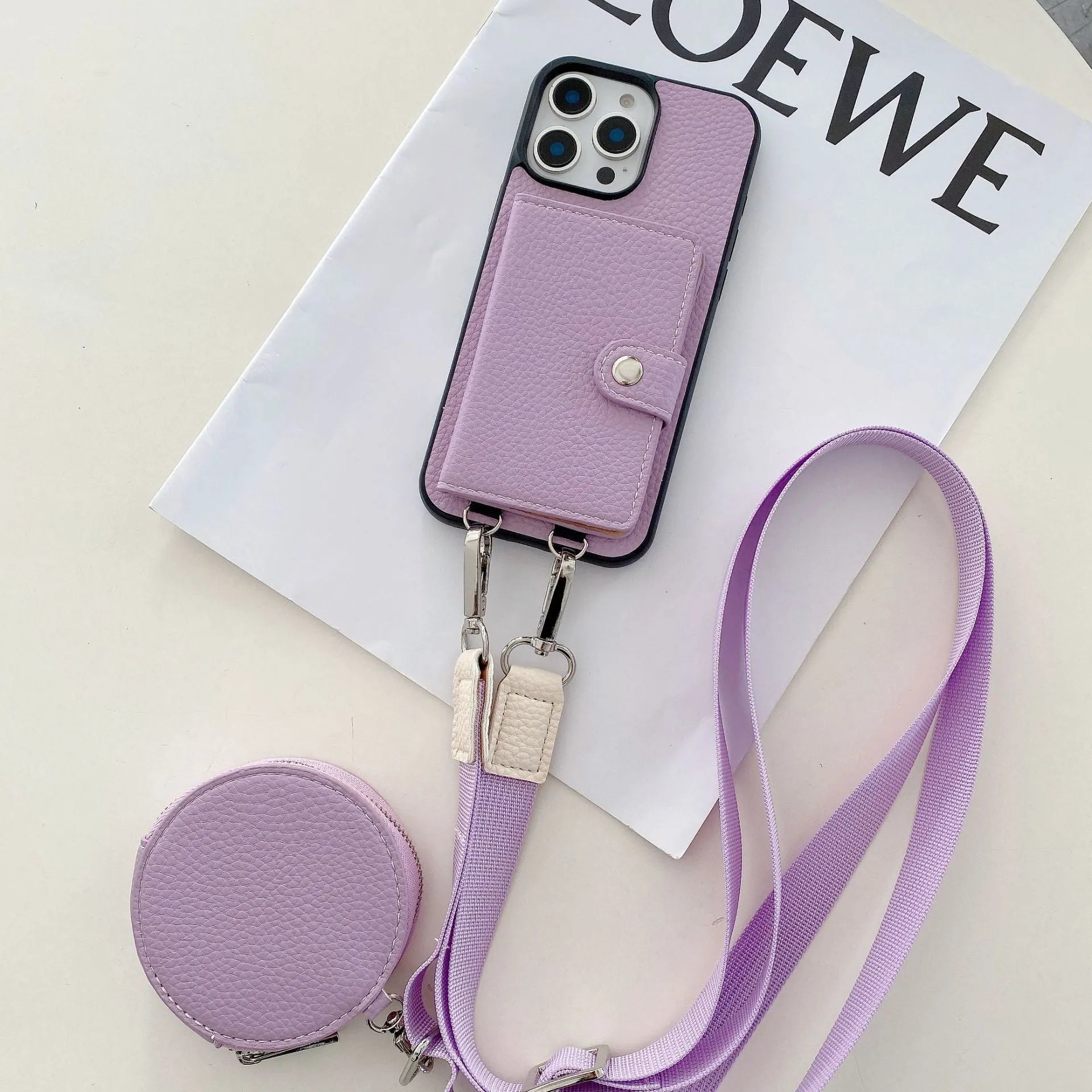 Black card holder lanyard phone case for iPhone showing integrated card slots on back and adjustable neck strap.