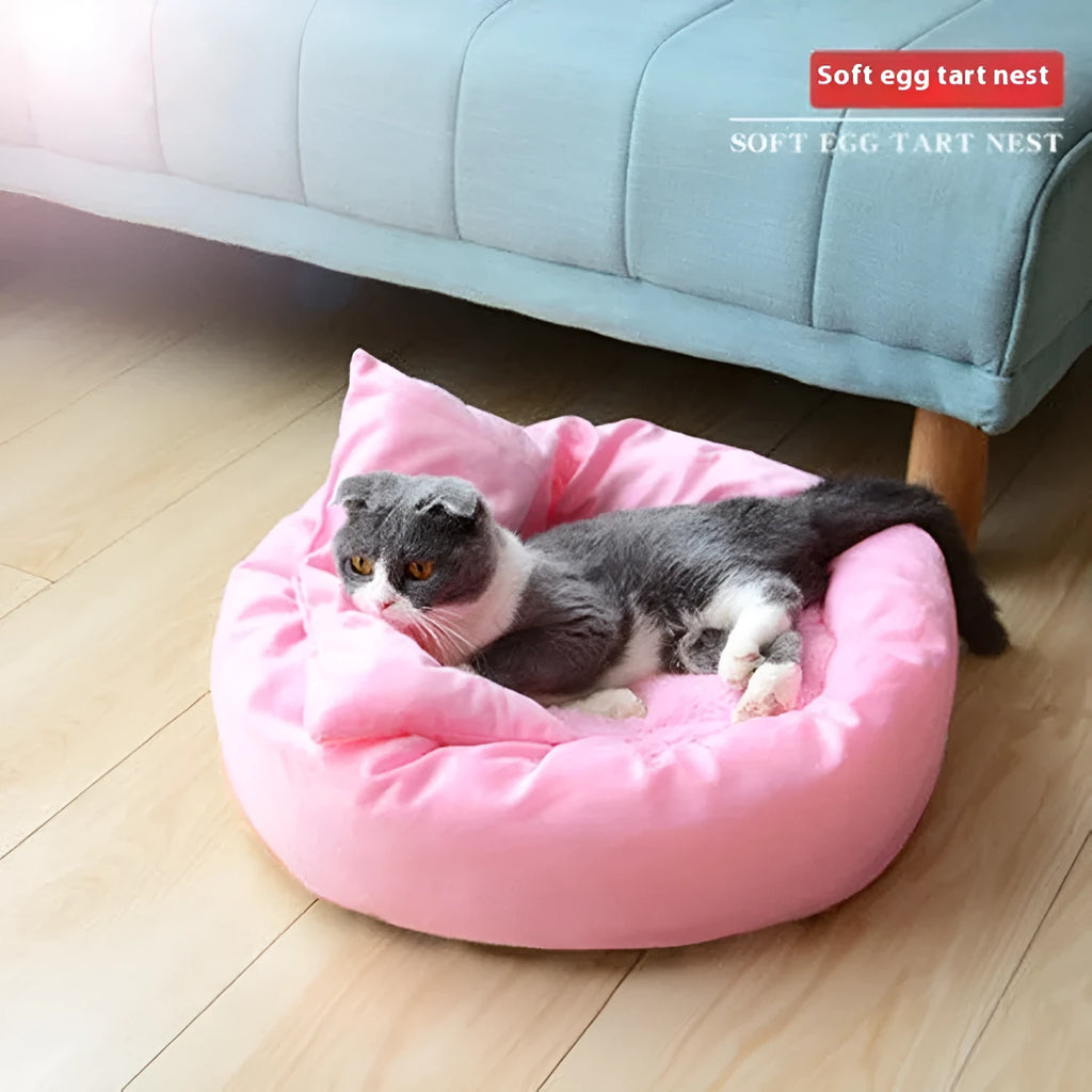 Light grey cotton-filled dog bed for a medium-sized dog with a matching pillow.