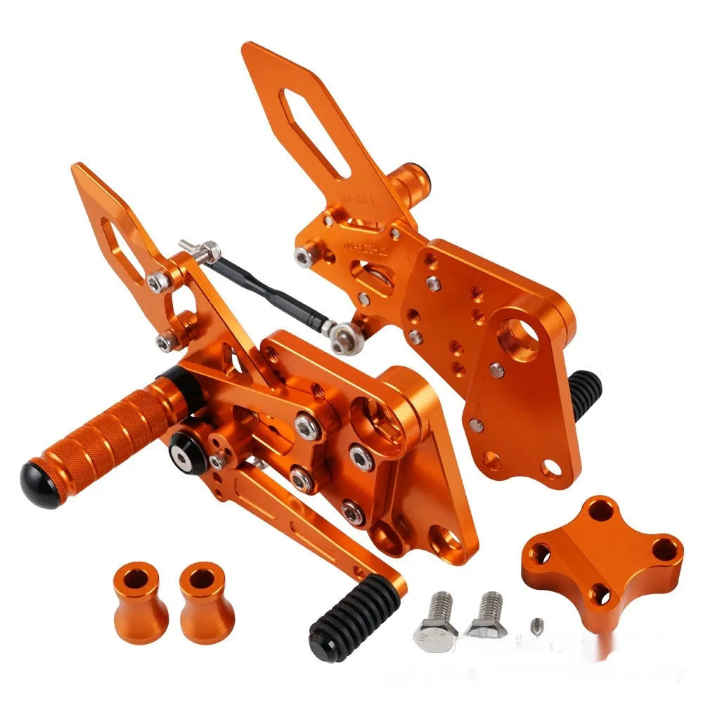 KTM Duke motorcycle black and orange foot pedal support assembly modification kit