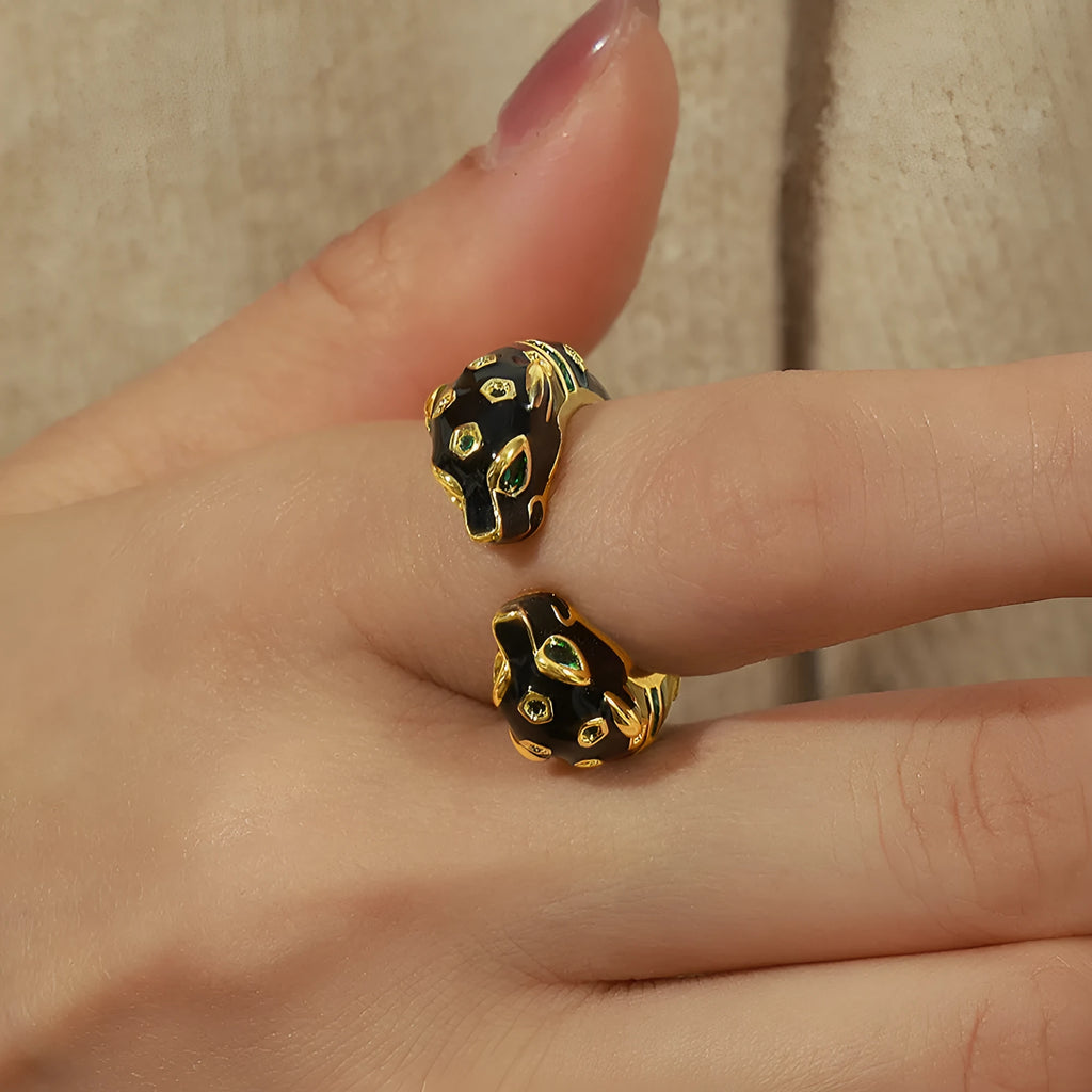 Geometric open ring with black cheetah oil drip print, size 7, on a copper band.