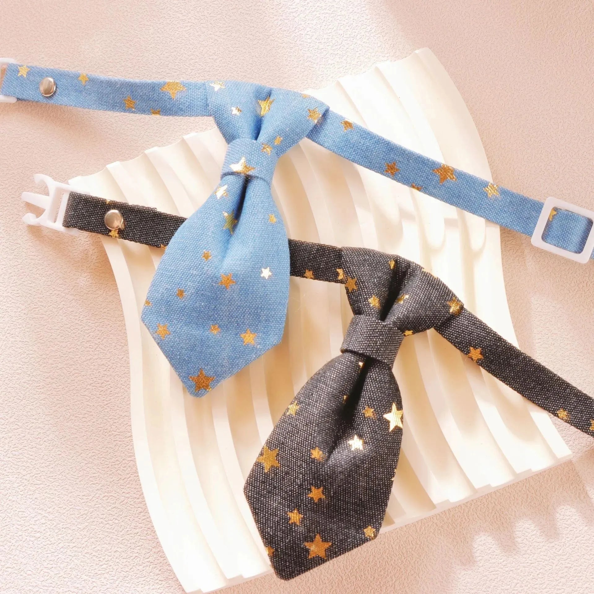 Designer dog collar with golden star decoration on adjustable strap, black colour, S size