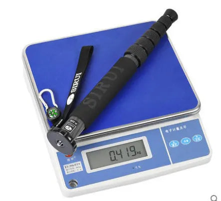 Black carbon fibre six-section DSLR camera monopod extended to maximum 1540mm height