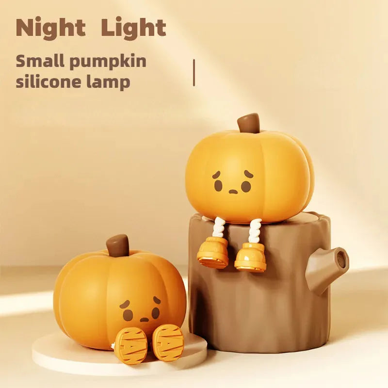 Soft silicone pumpkin-shaped night light with dimmable touch control on bedside table