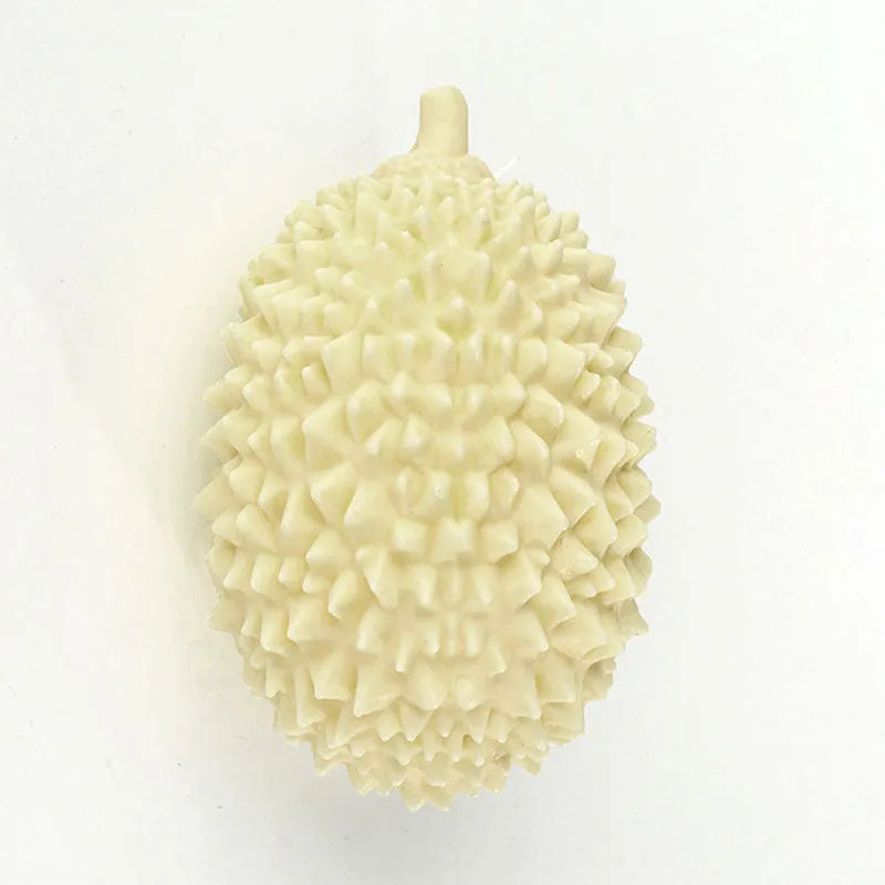 Colourful durian-shaped dog chew toy with textured surface and a squeaky ball
