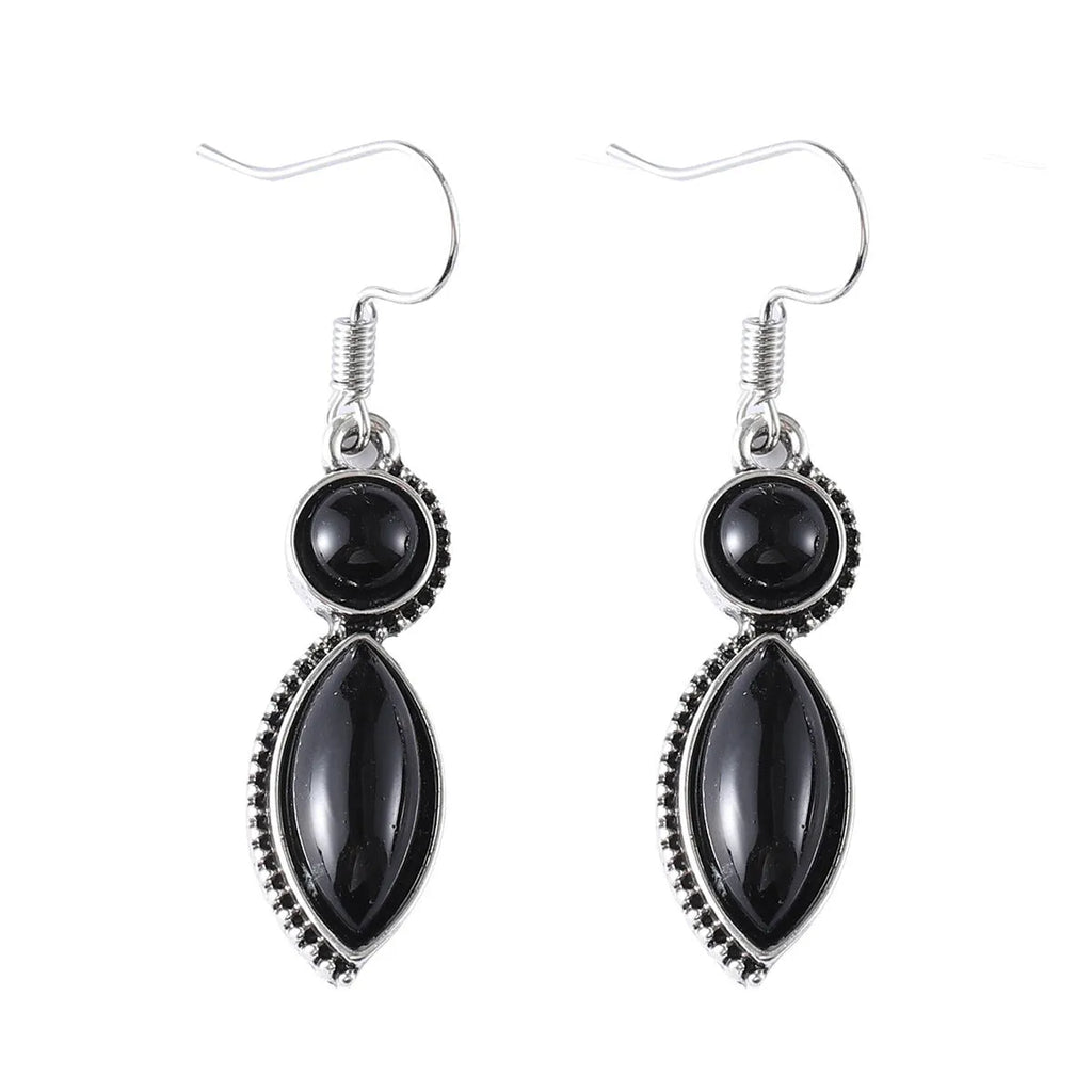 A pair of vintage-style geometric drop earrings with a round detail in black and purple electroplated zinc alloy.
