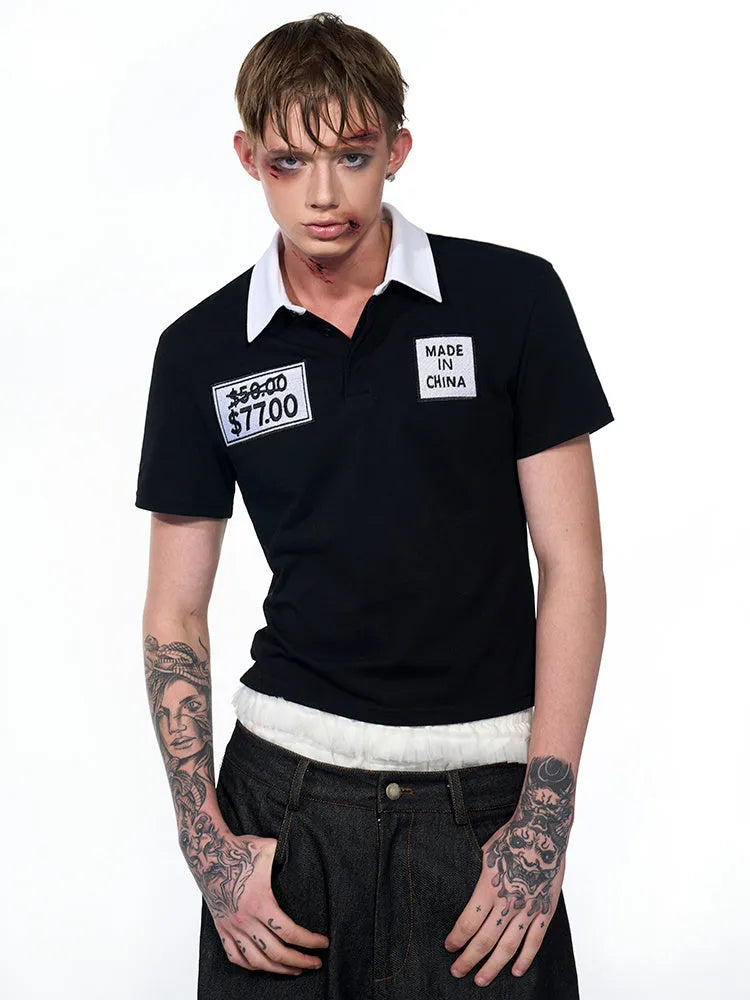 Black slim fit men's polo shirt with embroidery detail and short sleeves for summer wear