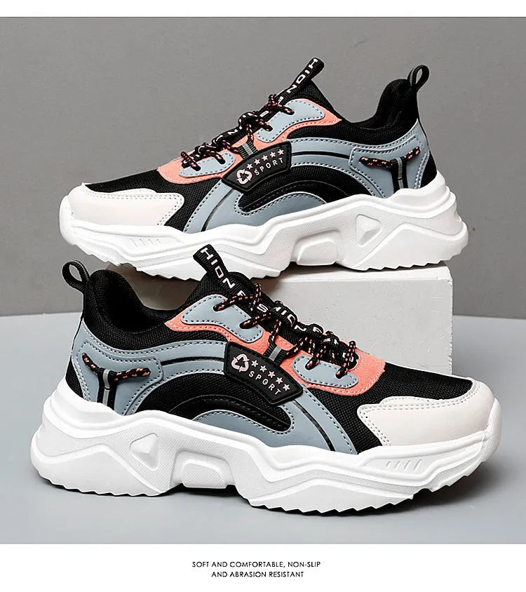 Women's white casual mesh sports shoes with round toe, buckle detail, and a thick PU sole.