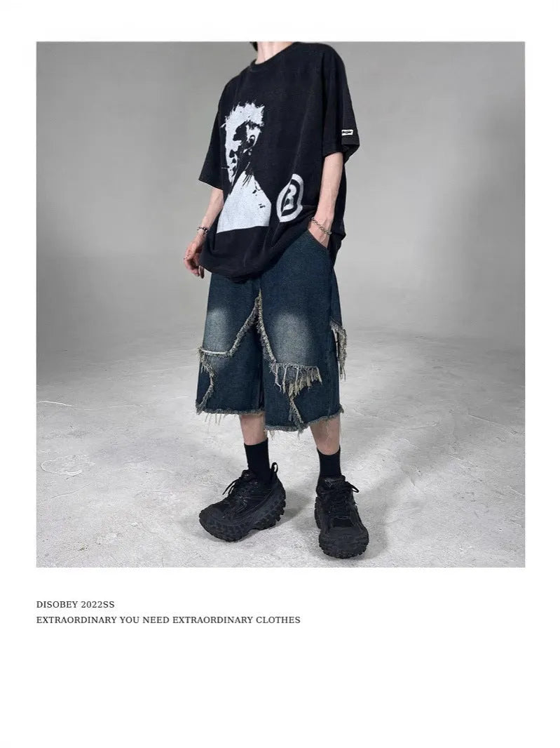 Blue denim shorts with frayed five-pointed star design detail, loose fit cut for summer casual wear