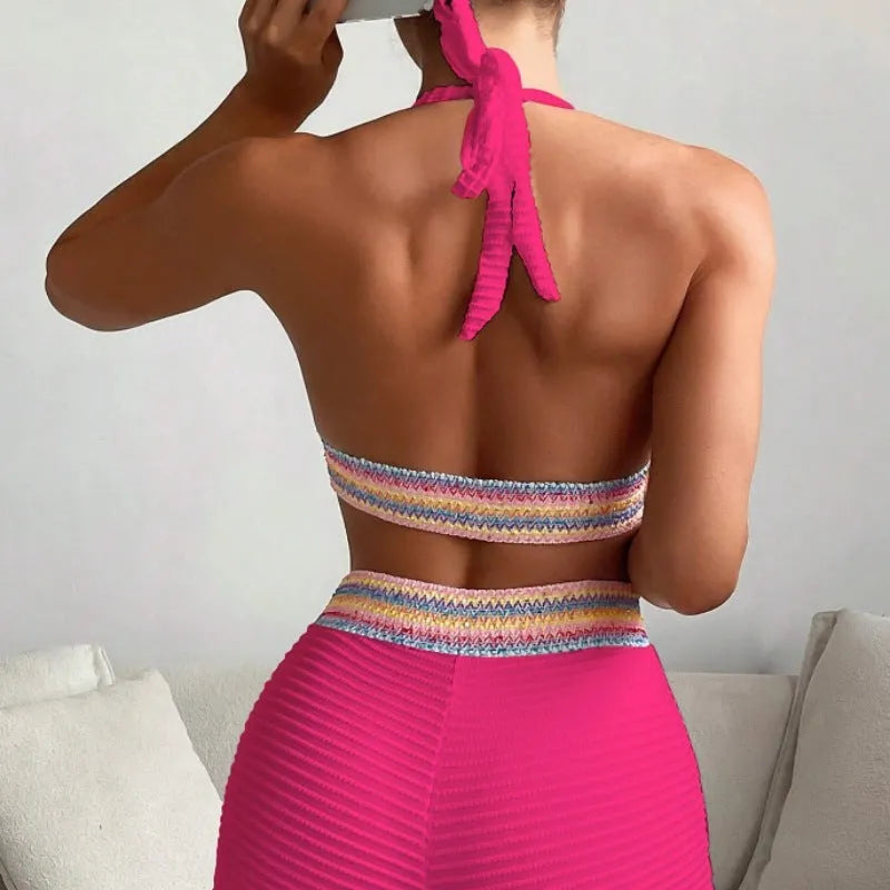 Women's high-waisted bikini suit in striped and solid colours