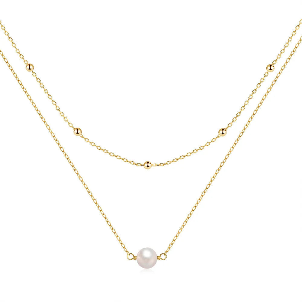 S925 Sterling silver double layer necklace with twin pearls on a ball bead chain, shown in gold and white gold colours.