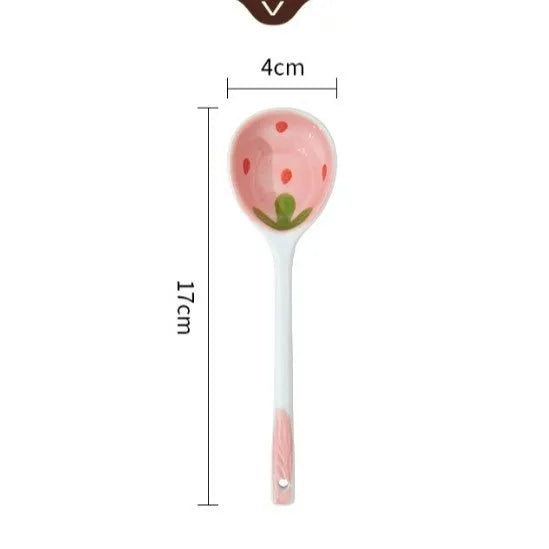 Creative strawberry-themed porcelain dinnerware set with fish plate, flower bowls, and straw hat plate.