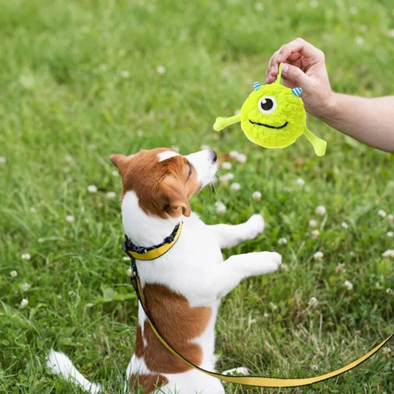 Green sound-activated dog teething ball toy with plush exterior