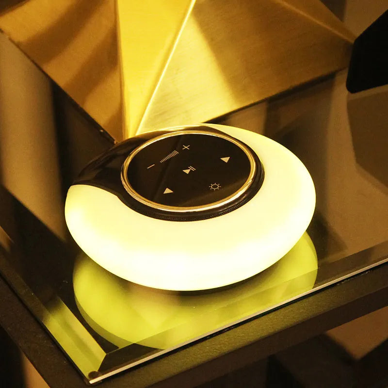 Blue folding Bluetooth desk lamp speaker with touch controls and LED lighting