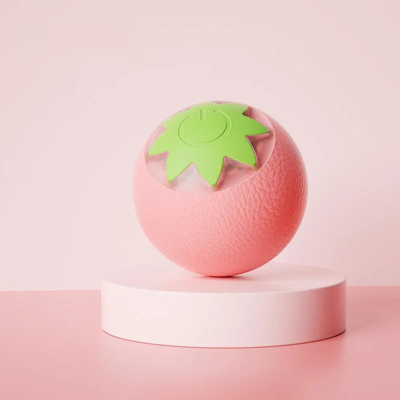 Green automatic rolling ball pet toy for cats and dogs measuring 4.5cm cube