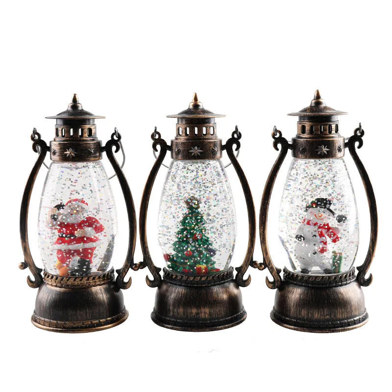 Clear plastic crystal ball LED portable oil lamp with a decorative snowman figure inside on a table.