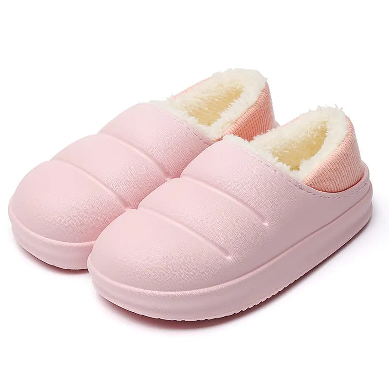 Green waterproof EVA cotton slipper with plush lining, flat sole, and hollow slip-on design.
