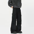 Man wearing retro style high-waisted straight leg casual trousers in black.