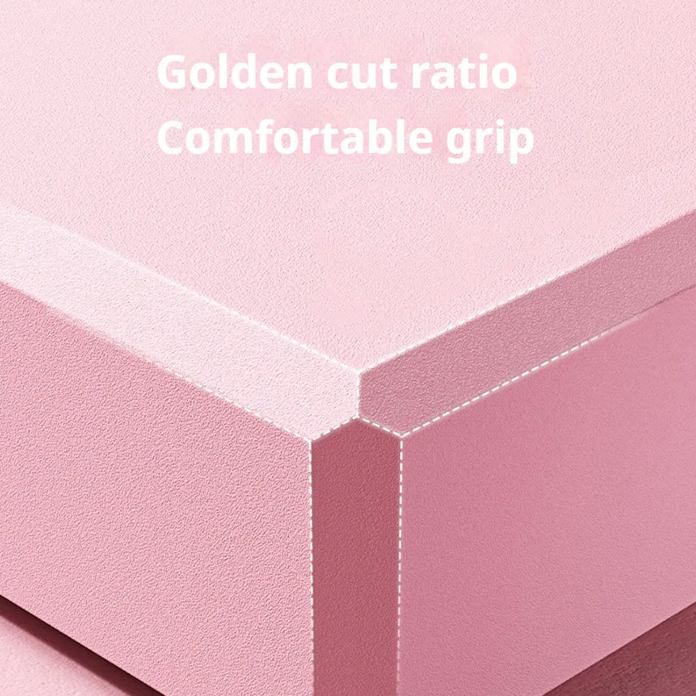 Solid blue EVA foam yoga brick with ridged hexagonal surface, shown next to a pink block.