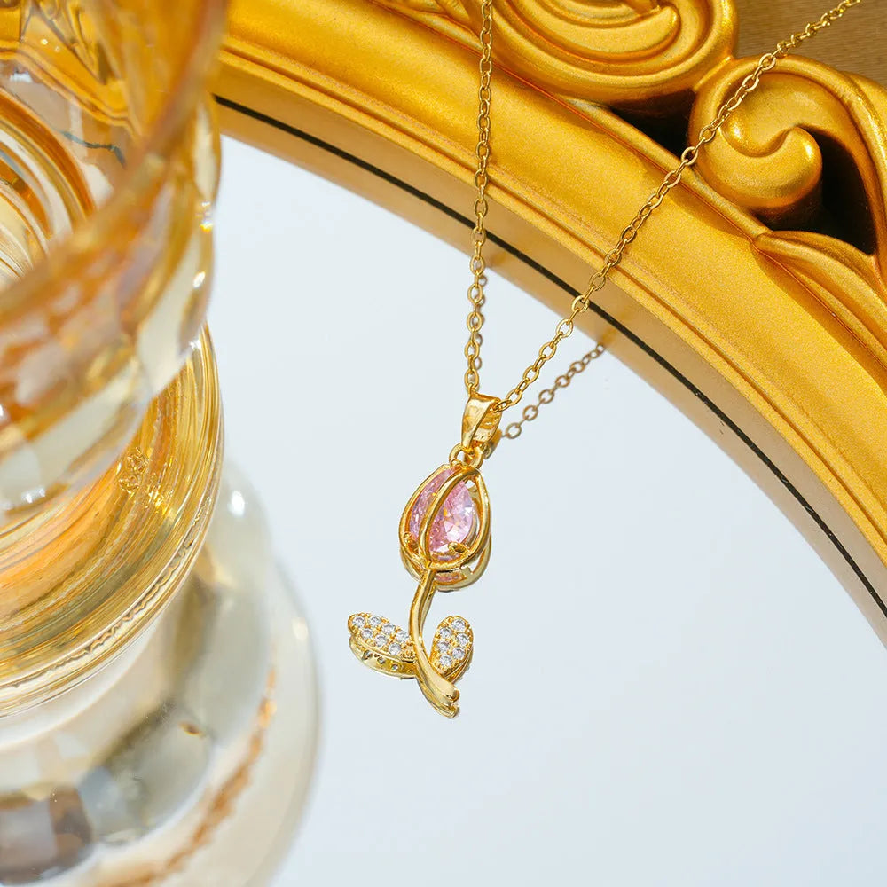 Gold tulip flower pendant necklace on an O-ring chain, showing adjustable length from 41cm to 50cm.